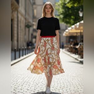 Aritzia BabatonTwirl pleated print midi skirt size M